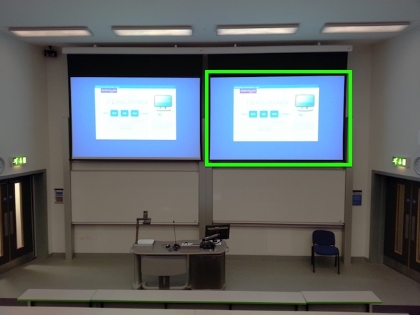 two projector screens side by side